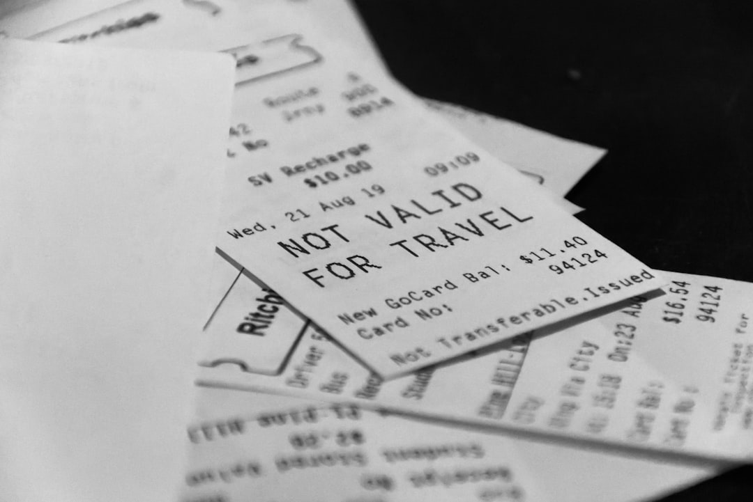 pile-of-receipts-one-says-not-valid-for-travel-dtkbde4ykj8